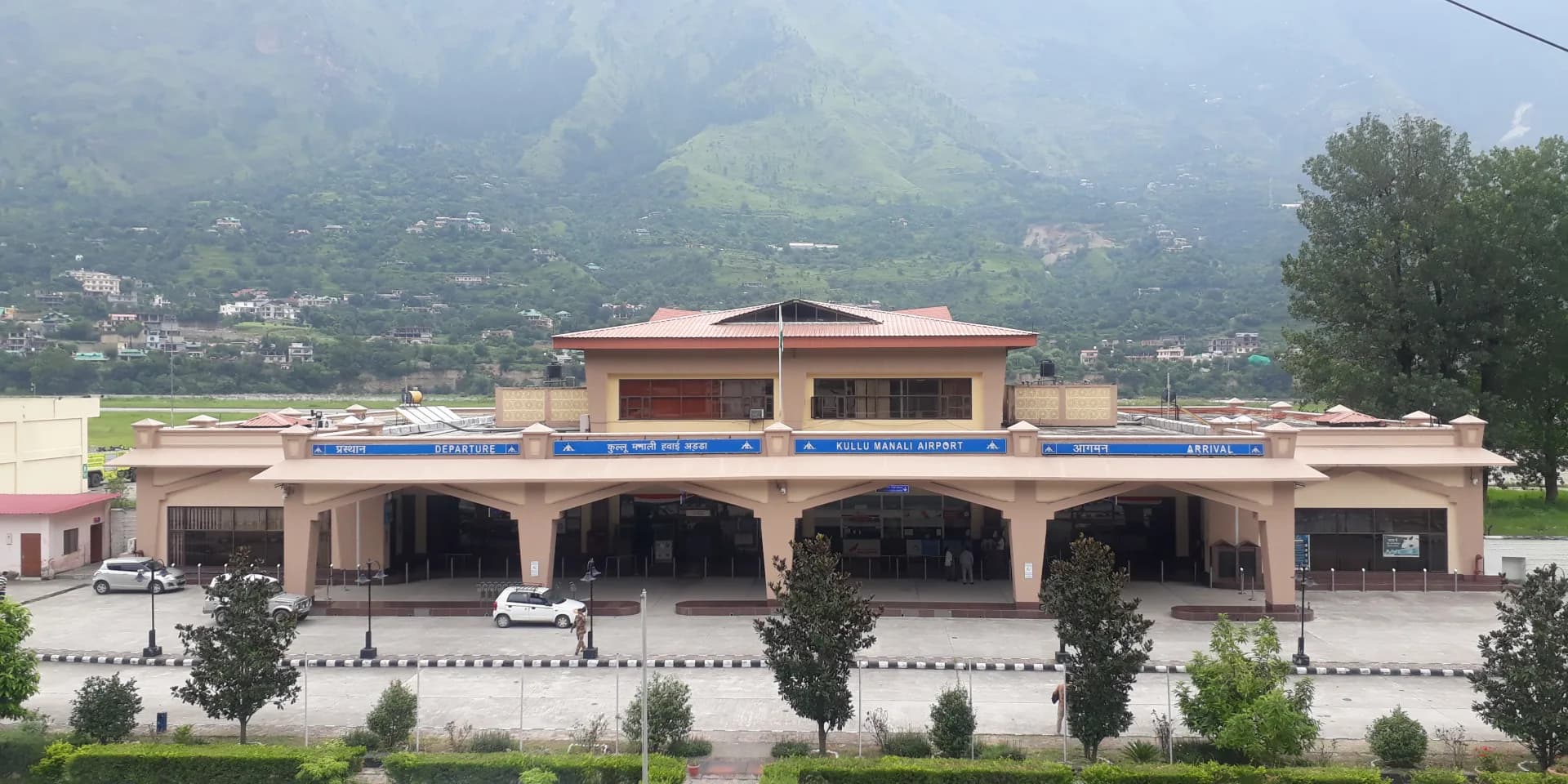 Kullu-Manali Airport terminal at Bhuntar with hills behind it