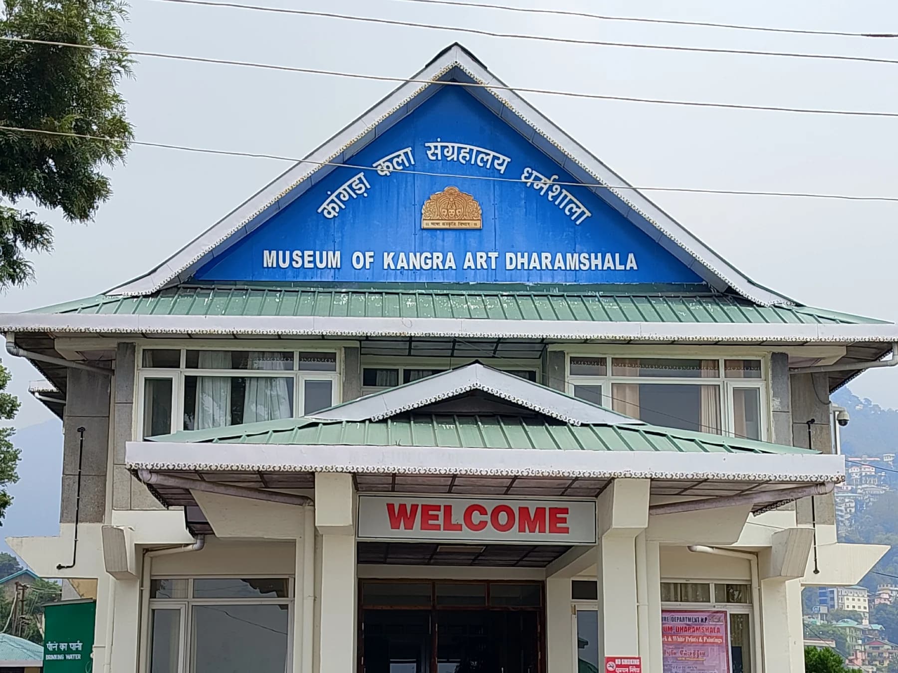 The blue gable and entrance canopy of the Museum of Kangra Art in Dharamshala