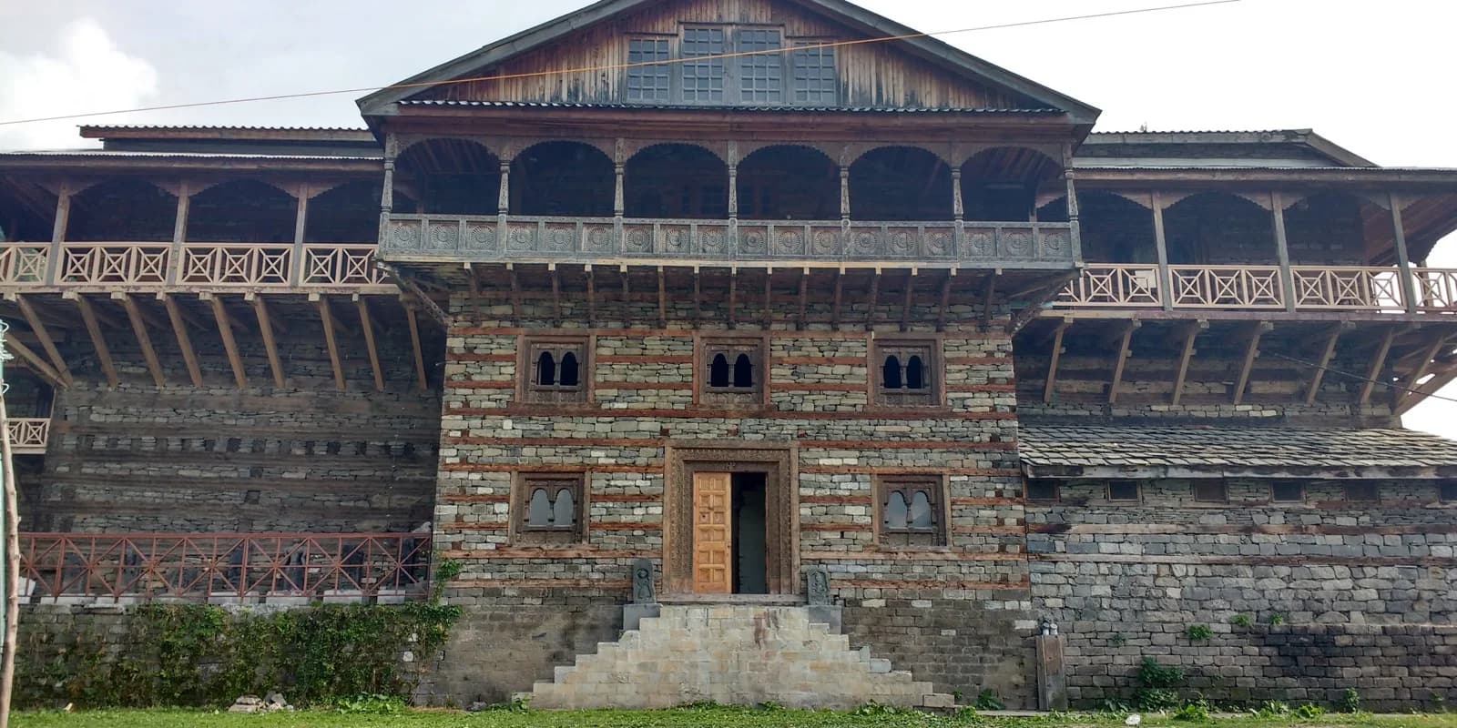 Stone and timber facade of Naggar Castle in Naggar